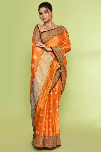 Women`s orange zari cotton tissue jamdani saree