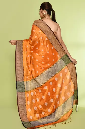 Women`s orange zari cotton tissue jamdani saree