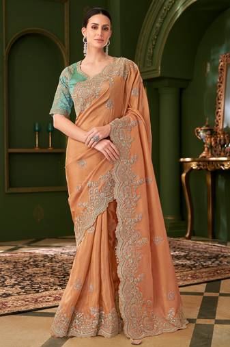 saffron viscose georgette silk blend saree with tussar silk blend blouse 