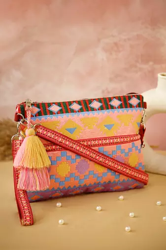 tribal magenta & multi acrylic jacquard ethnic motifs embroidered sling bag