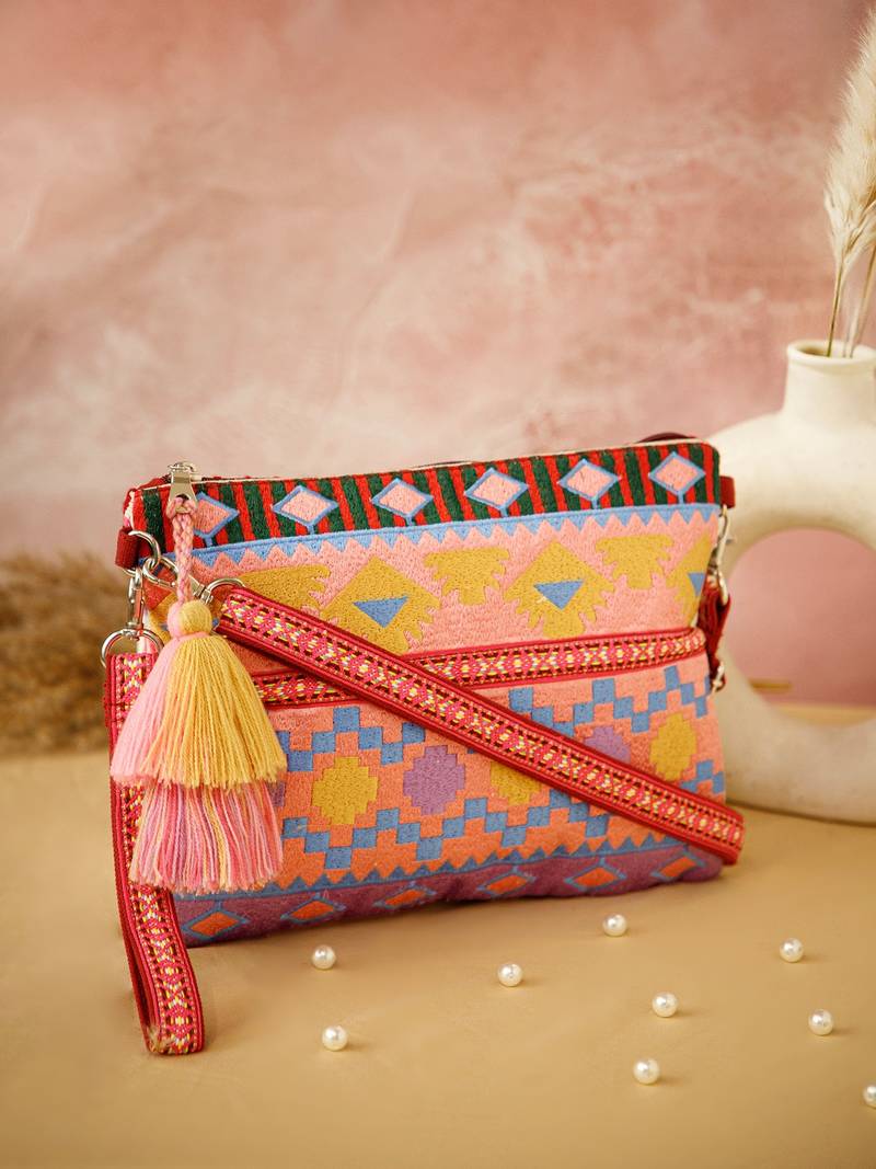 tribal magenta & multi acrylic jacquard ethnic motifs embroidered sling bag