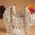 fringe flirt ivory & champagne faux silk clustered beadwork clutch