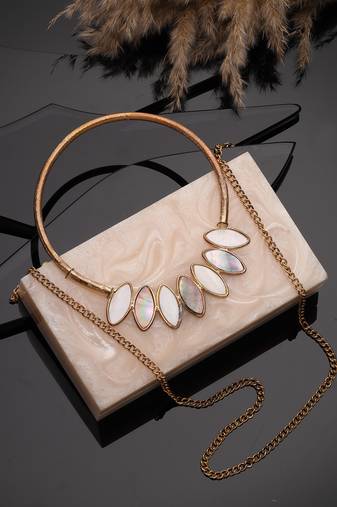 marble muse pearl cream resin marble textured clutch