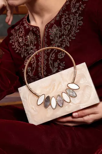 marble muse pearl cream resin marble textured clutch