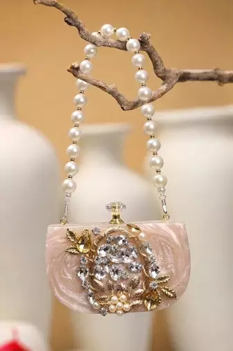 marble muse beige, ivory & gold resin embellished clutch