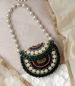 metal mirage green, ivory & multi concentric motif embellished clutch