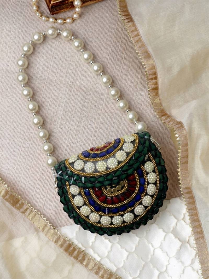 metal mirage green, ivory & multi concentric motif embellished clutch