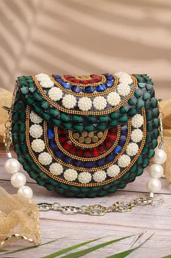 metal mirage green, ivory & multi concentric motif embellished clutch