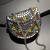 metal mirage silver & multi studs mosaic clutch