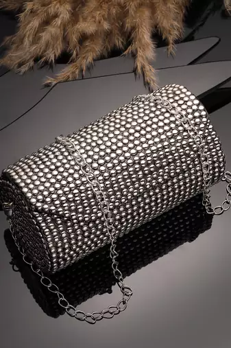 metal mirage metallic silver studded mosaic clutch