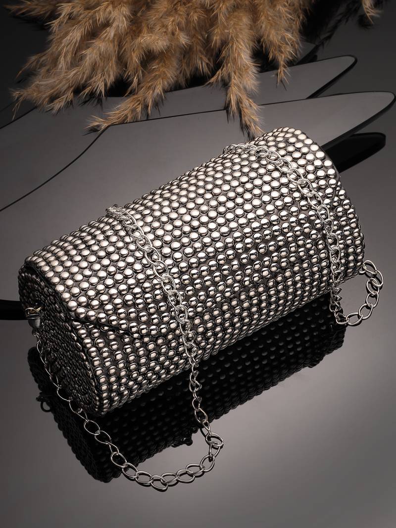 metal mirage metallic silver studded mosaic clutch