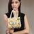 petal posh ivory & multi canvas floral motif beaded clutch