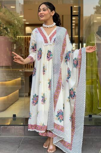 White cotton print with heavy thread embroidered work  kurta pant set