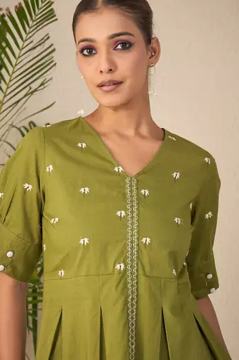 green embroidered cotton peplum top for women