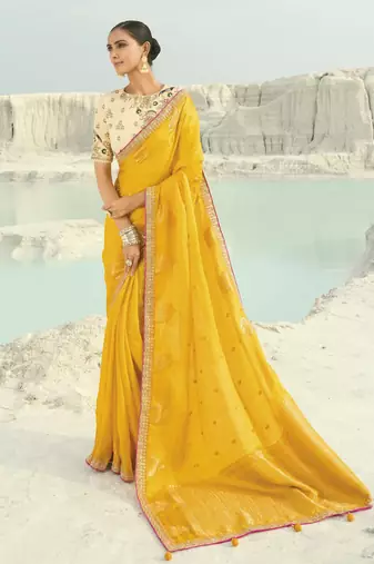 yellow organza viscose satin saree with silk blend blouse
