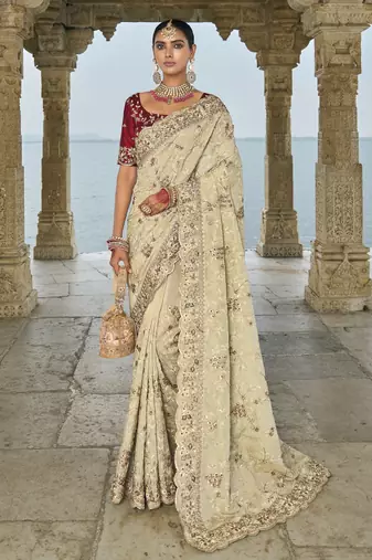 cream banarasi jari saree with lucknowi & jarkhan heavy work and silk blend blouse