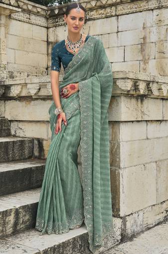 sea green crush tissue saree with heavy jarkhan, cut-dana & moti embroidery and russian silk blend blouse