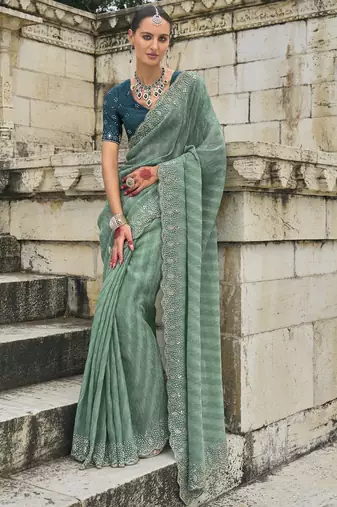 sea green crush tissue saree with heavy jarkhan, cut-dana & moti embroidery and russian silk blend blouse