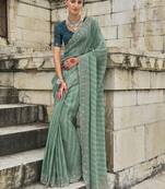 sea green crush tissue saree with heavy jarkhan, cut-dana & moti embroidery and russian silk blend blouse