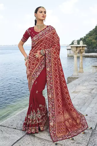 maroon bandhej pallu and dola silk blend skirt saree with mirror, jari & moti heavy work and silk blend blouse