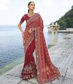 maroon bandhej pallu and dola silk blend skirt saree with mirror, jari & moti heavy work and silk blend blouse