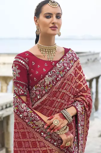 maroon bandhej pallu and dola silk blend skirt saree with mirror jari & moti work and silk blend blouse