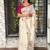Cream kashmiri style thread embroidered work saree with unstitched blouse