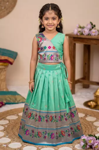 green paithani pattu pavadai for girls ethnic wear