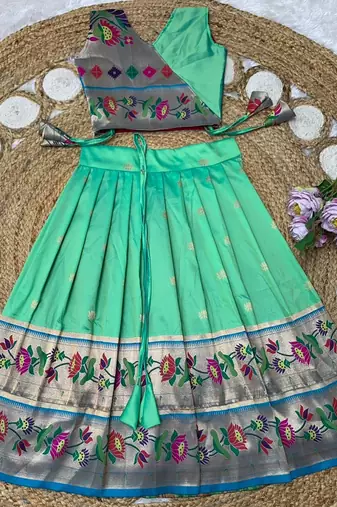 green paithani pattu pavadai for girls ethnic wear