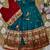 teal paithani pattu pavadai for girls ethnic wear