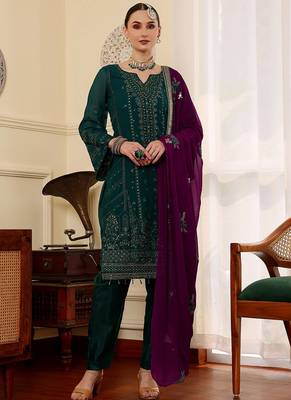 Green  embroidered faux georgette pakistani suit 1