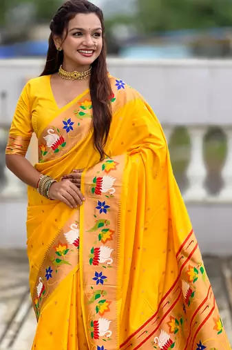 yellow faux banarasi silk blend saree with paithani rich weaved pallu and blouse