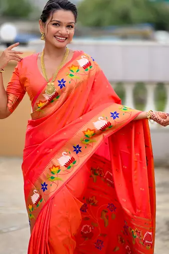 orange faux banarasi silk blend saree with paithani rich weaved pallu and blouse