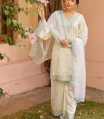 Floral embroidered white v neck kurat set with trouser & dupatta