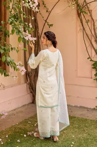 Floral embroidered white v neck kurat set with trouser & dupatta