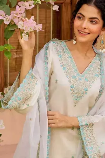 Floral embroidered white v neck kurat set with trouser & dupatta