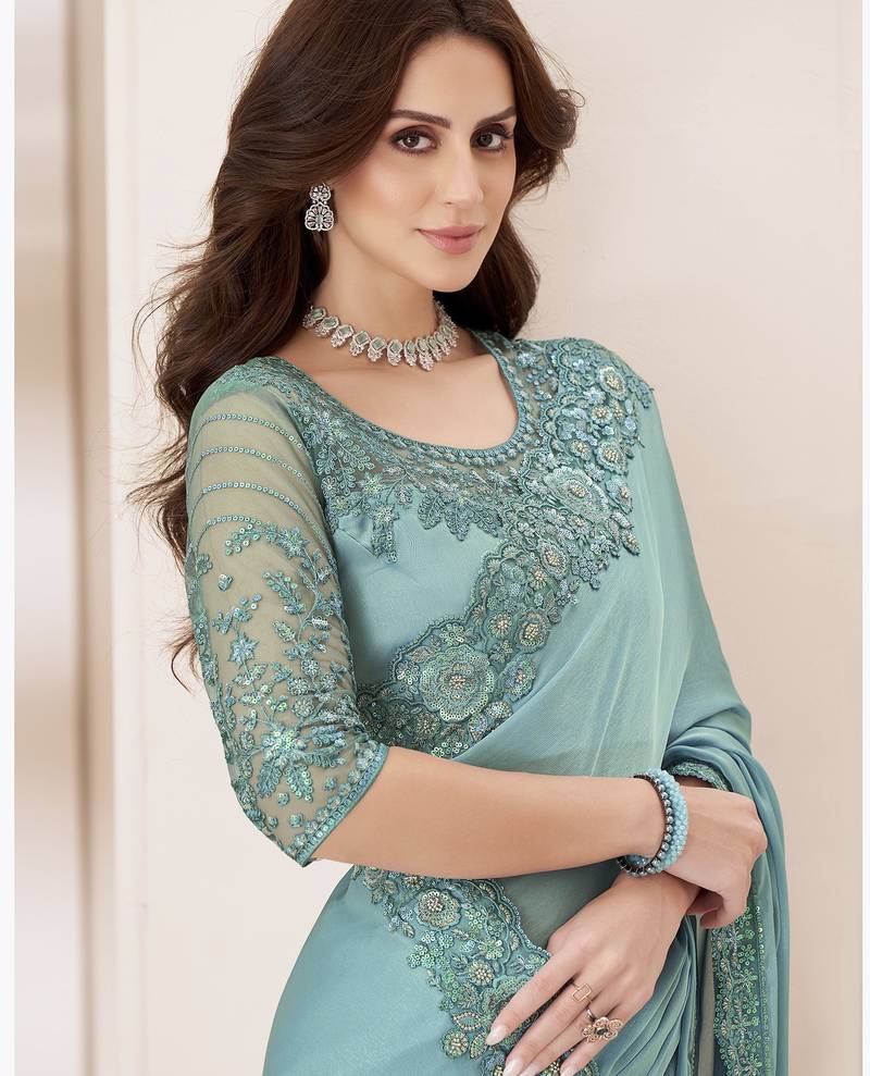 Sky blue satin georgette silk saree with luxurious banglori silk blouse for weddings and festive occasions