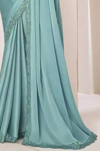 Sky blue satin georgette silk saree with luxurious banglori silk blouse for weddings and festive occasions