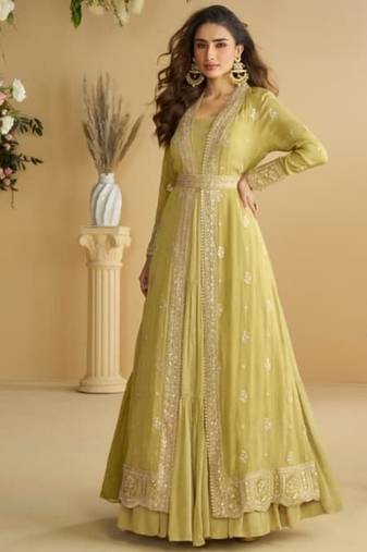 Green chinon silk two piece full stitched gownd with belt size upto 44
