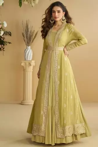 Green chinon silk two piece full stitched gownd with belt size upto 44