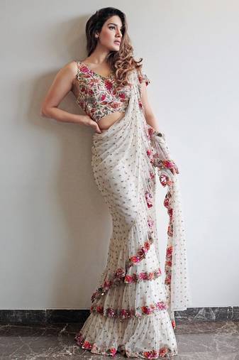 White faux georgette with embroidered sequence work ruffle saree with unstitched blouse