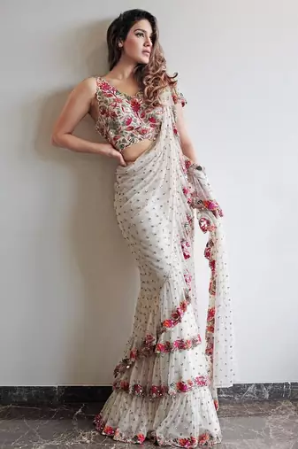 White faux georgette with embroidered sequence work ruffle saree with unstitched blouse