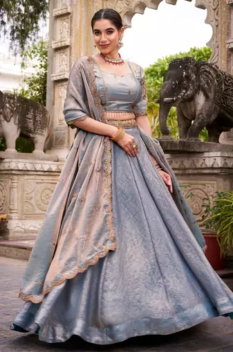 Elegant sky blue Fendi Silk Lehenga Choli with Zari and Lace Detailing Dupatta