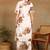 women's printed liva fabric white & brown floral kurta set with pockets