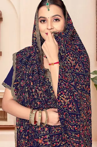 Navy blue color georgette embroidered  saree with blouse
