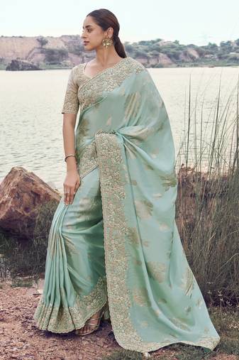 sky blue tissue silk blend jacquard saree with chiku pure tissue blouse     soft & elegant designer saree