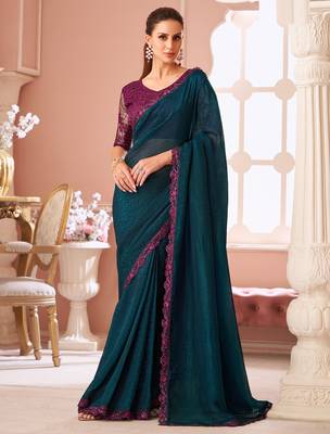 Peacock blue fancy fabric designer lace border saree with heavy work blouse for wedding party 1