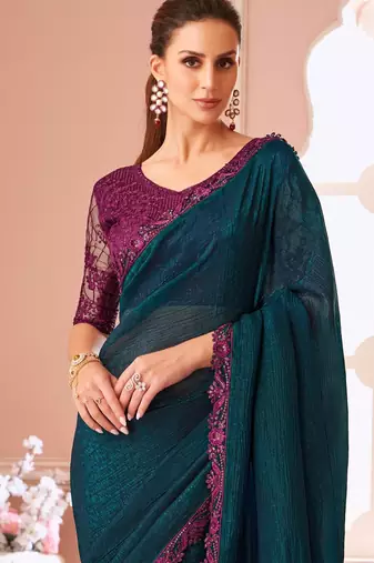 Peacock blue fancy fabric designer lace border saree with heavy work blouse for wedding party