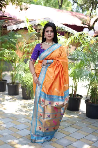 orange woven paithani silk blend saree with blouse