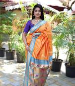orange woven paithani silk blend saree with blouse